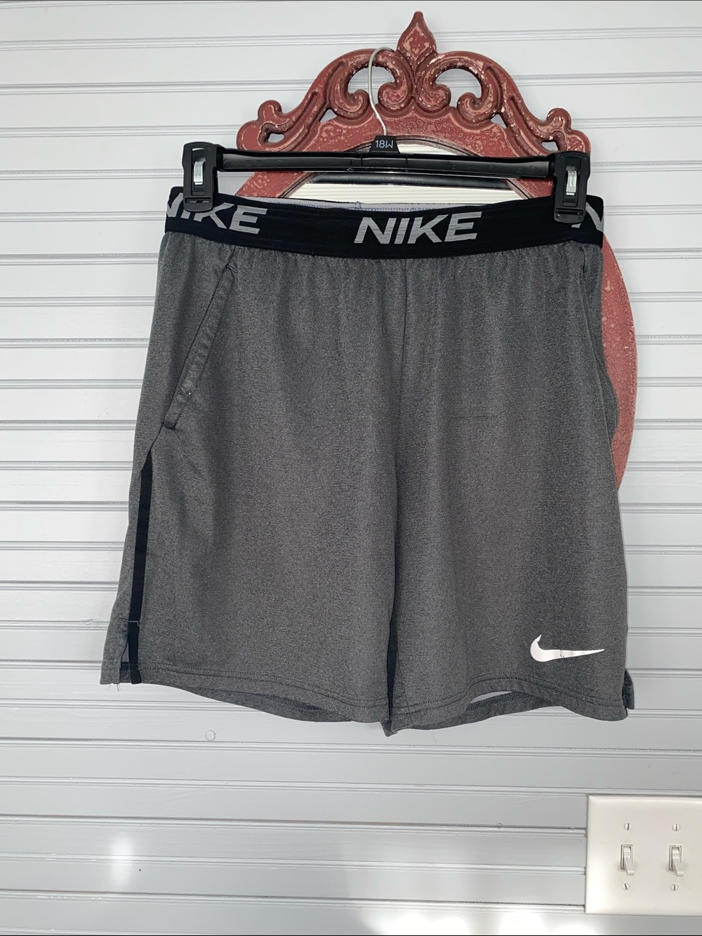 Nike Men’s Gray Athletic Shorts with Black Waistband and White Swoosh